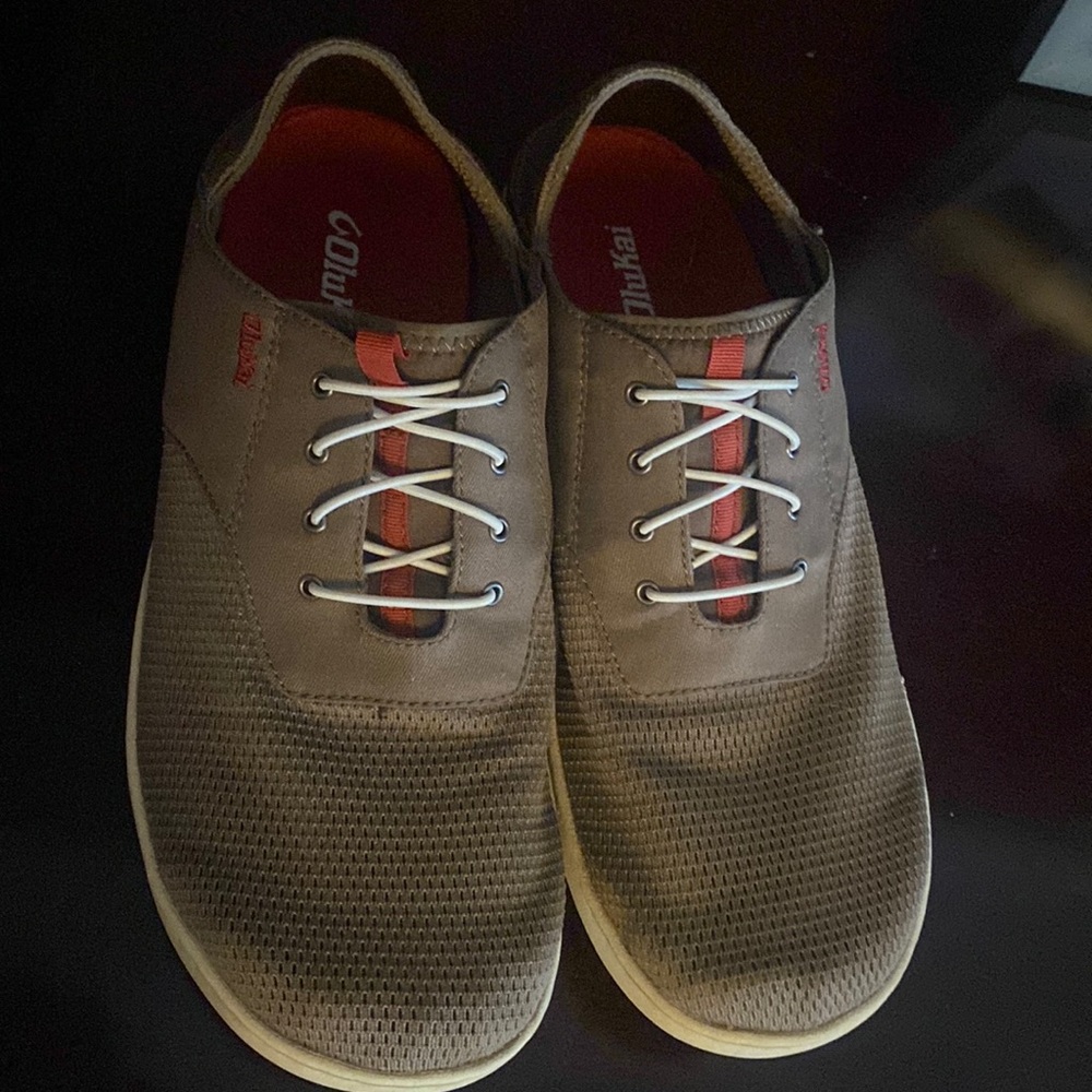 Olukai Mens no tie boat/land shoe. Light weight slightly worn comfortable